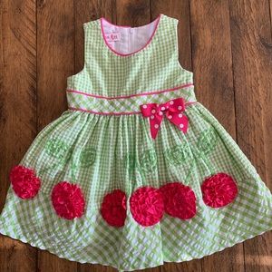 Green gingham with flowers dress.